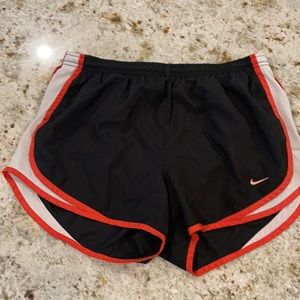 Coral Nike athletic shorts